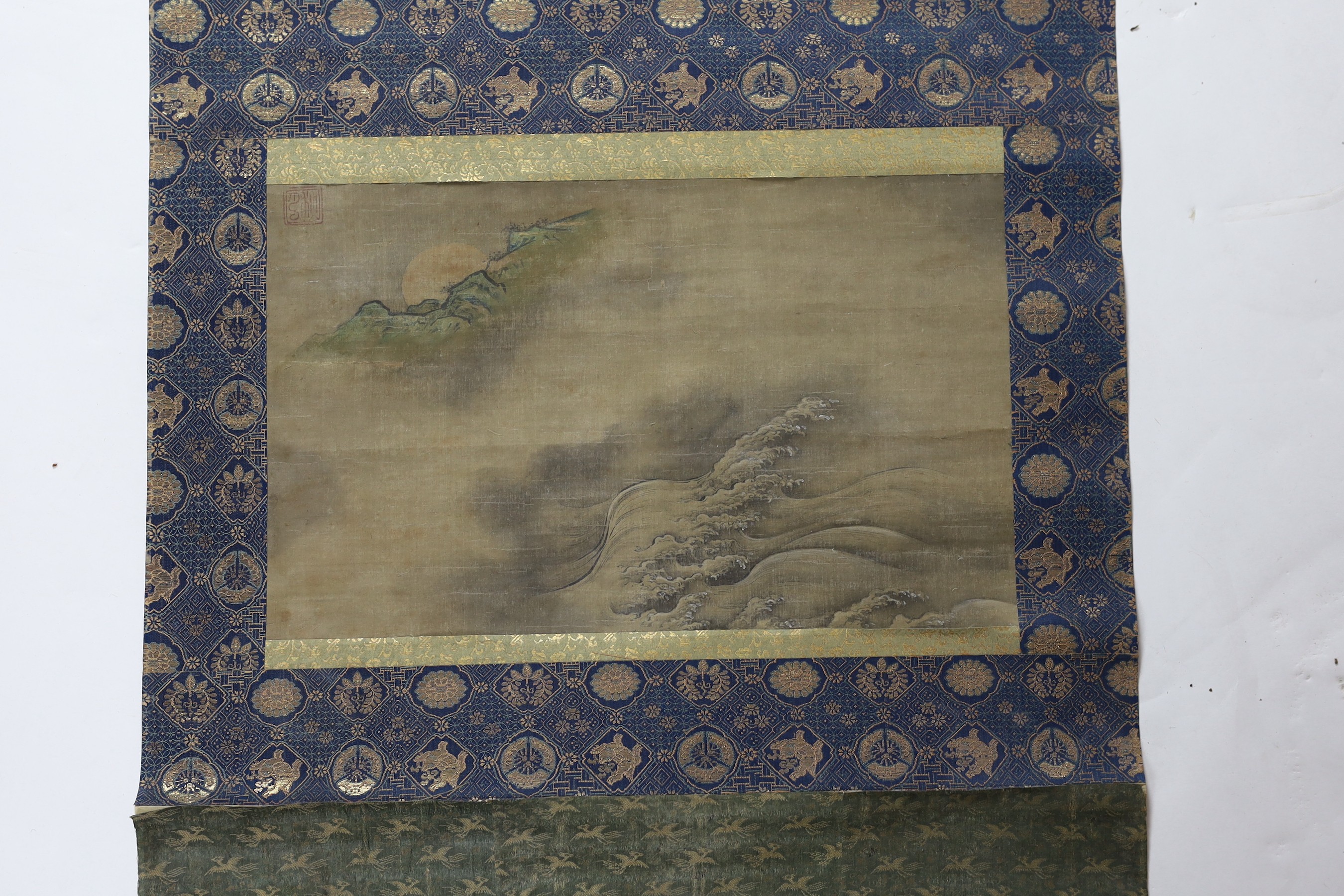 Japanese School, late Edo period, scroll painting of waves and the moon behind rocks, image 28.5cm x 46.5cm